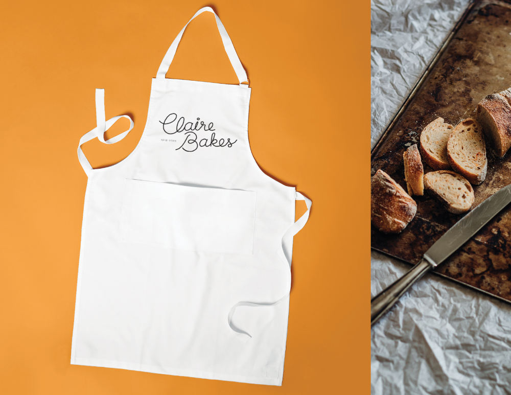 White apron with logo on the chest.